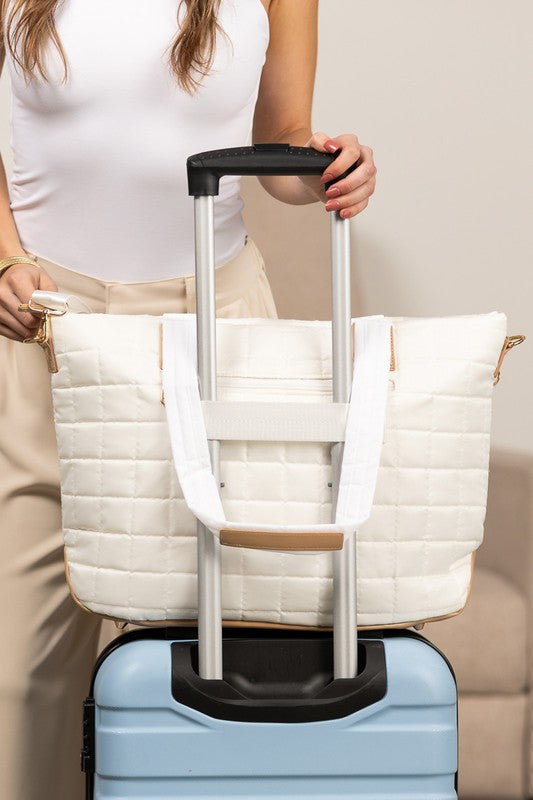 quilted travel bag with mini clutch