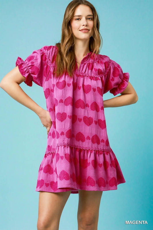 model wearing short sleeve pink baby doll dress