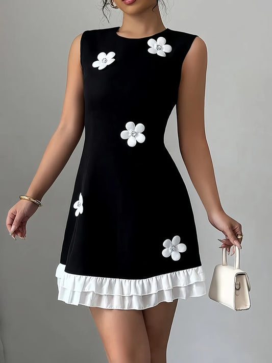 Black and white flower dress with ruffle hem